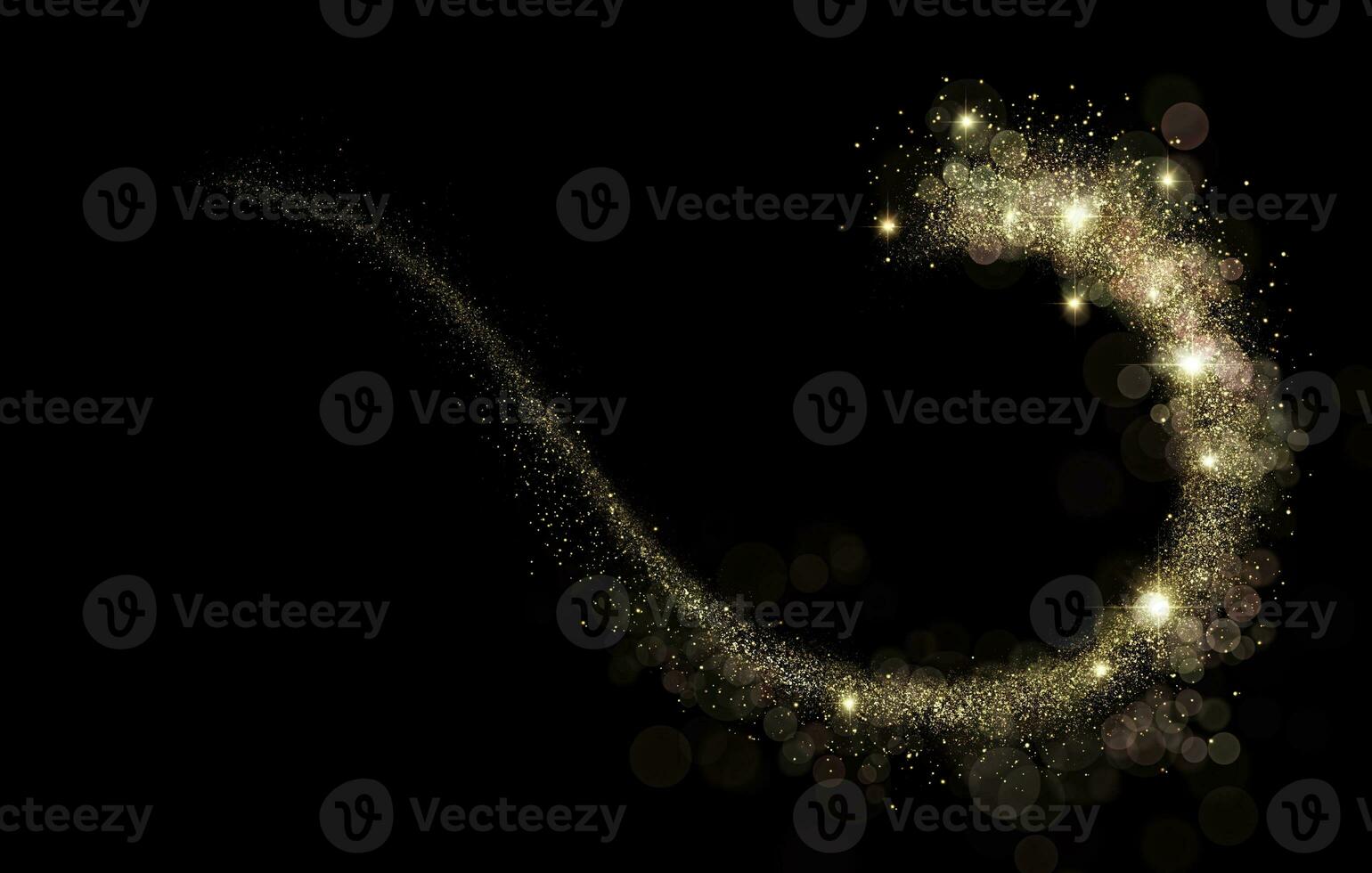 Luxury gold glitter. golden sparkle confetti. shiny glittering dust photo