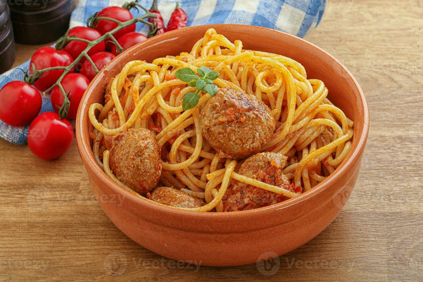 Spaghetti with meatball in tomato sause photo