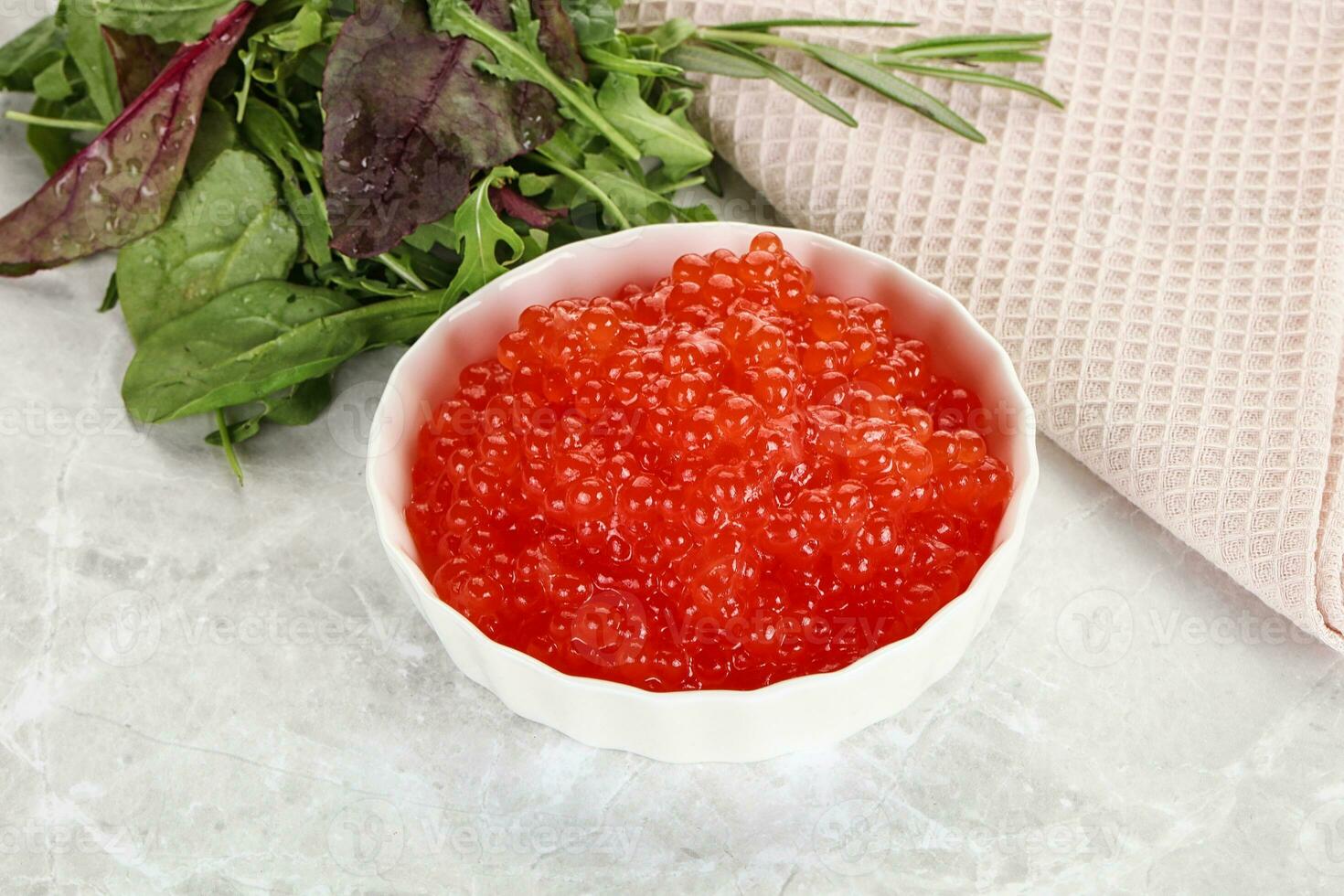 Red caviar in the bowl photo