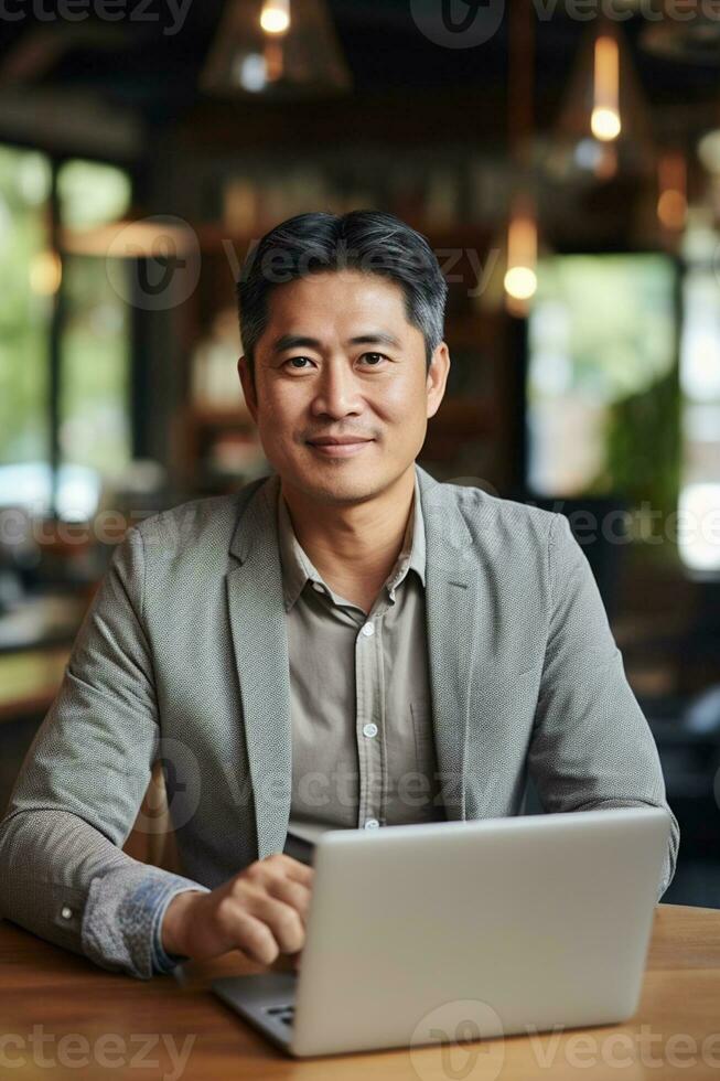 Casual Asian businessman using a laptop computer in the office, entrepreneur. Small business owner doing business online. AI Generative photo
