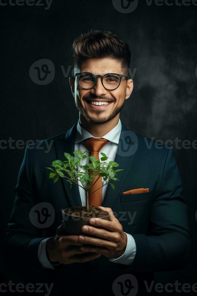 A casual man stands holding a green plant in a small pot. An entrepreneurial employee is happy with a growing plant. Startup projects, profits, investments and growth ideas. Ai Generative photo