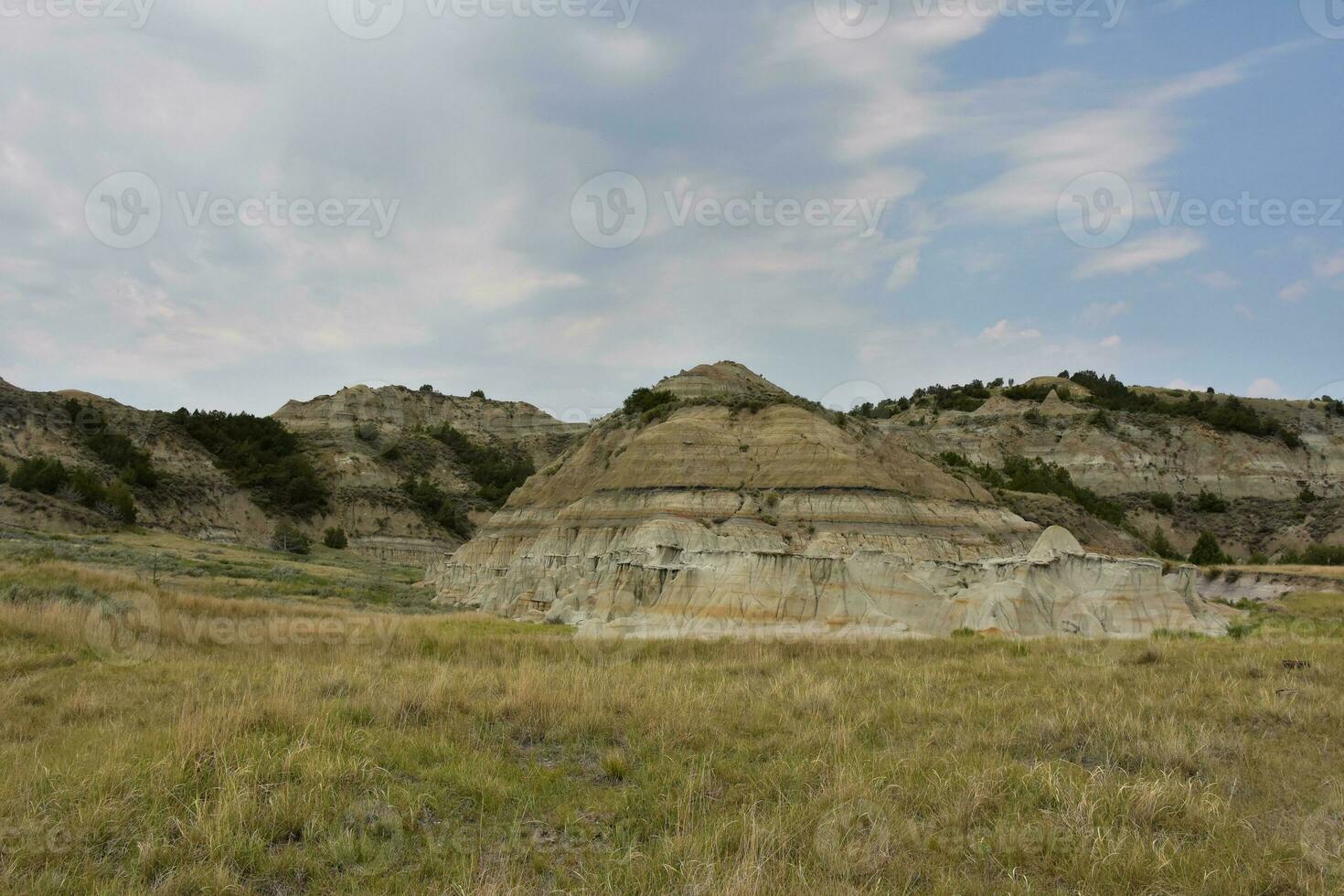 Cloudy Summer Skies Over a Rural Rugged Landscape photo
