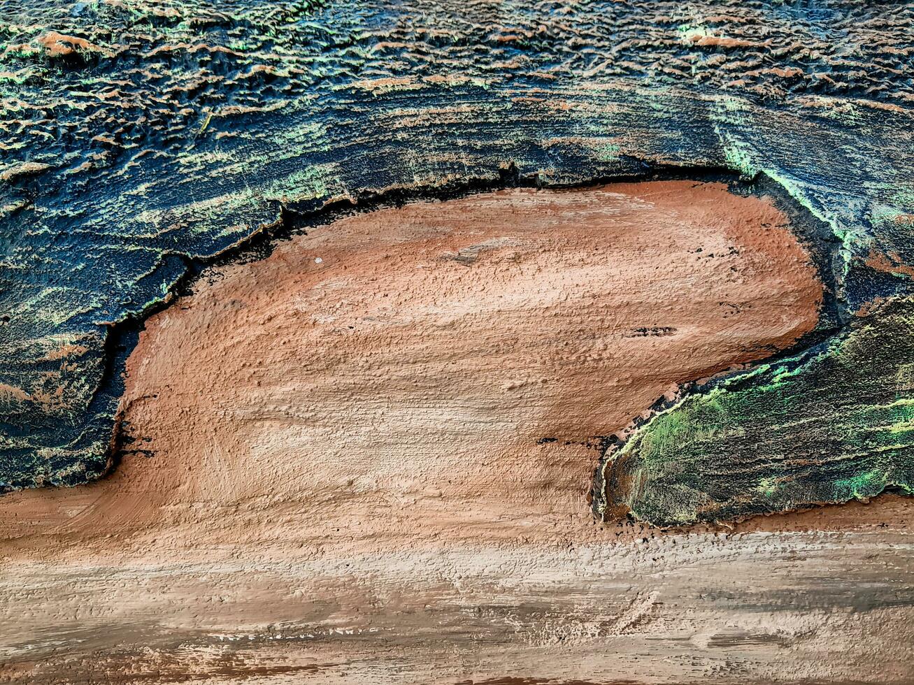 Closeup of tree trunk. Concrete wood texture. Tree bark texture of the cement relief plaster wall with natural color paint. photo