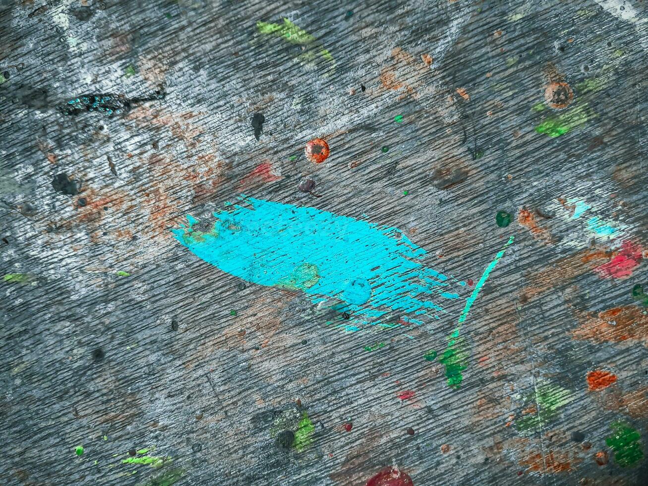 Abstract painting of a brush strokes on stained wood texture photo