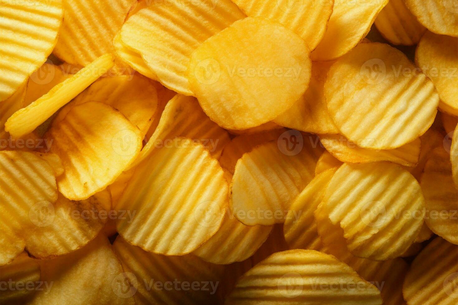 Crispy potato chips viewed from the top, forming a textured background AI Generated photo