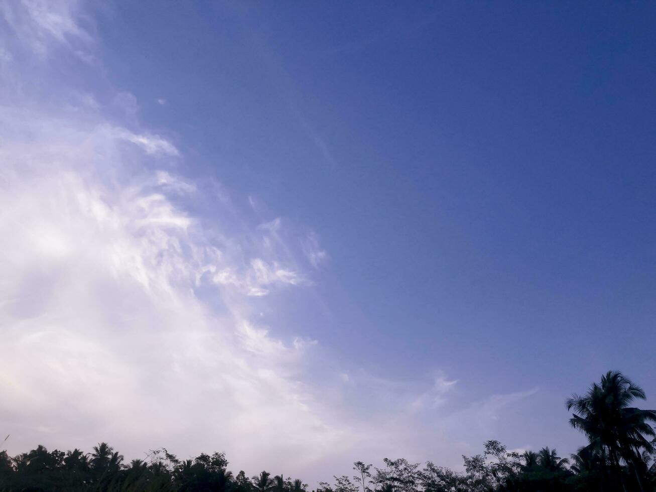 A bright blue sky during the day. photo