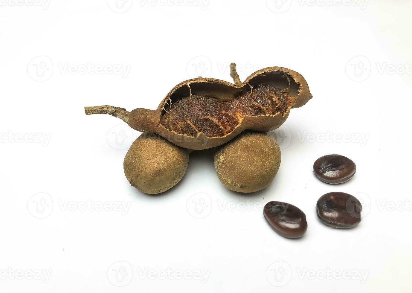 Tamarind, an Asian spice, isolated on a white background. photo
