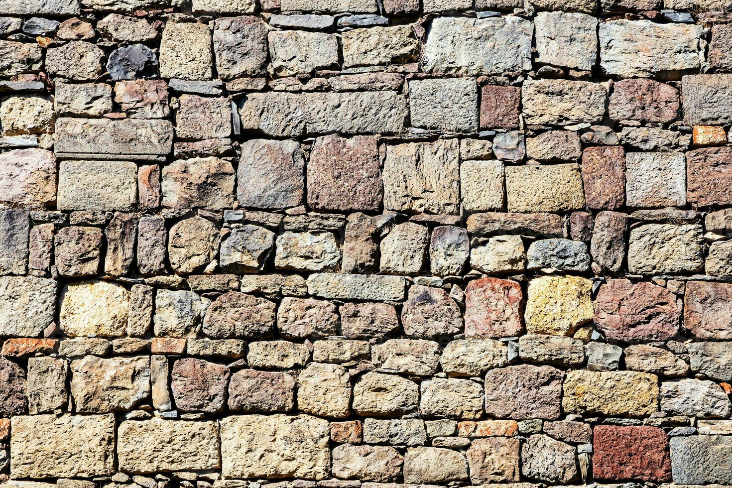 medieval pared desde vistoso piedras como antecedentes foto