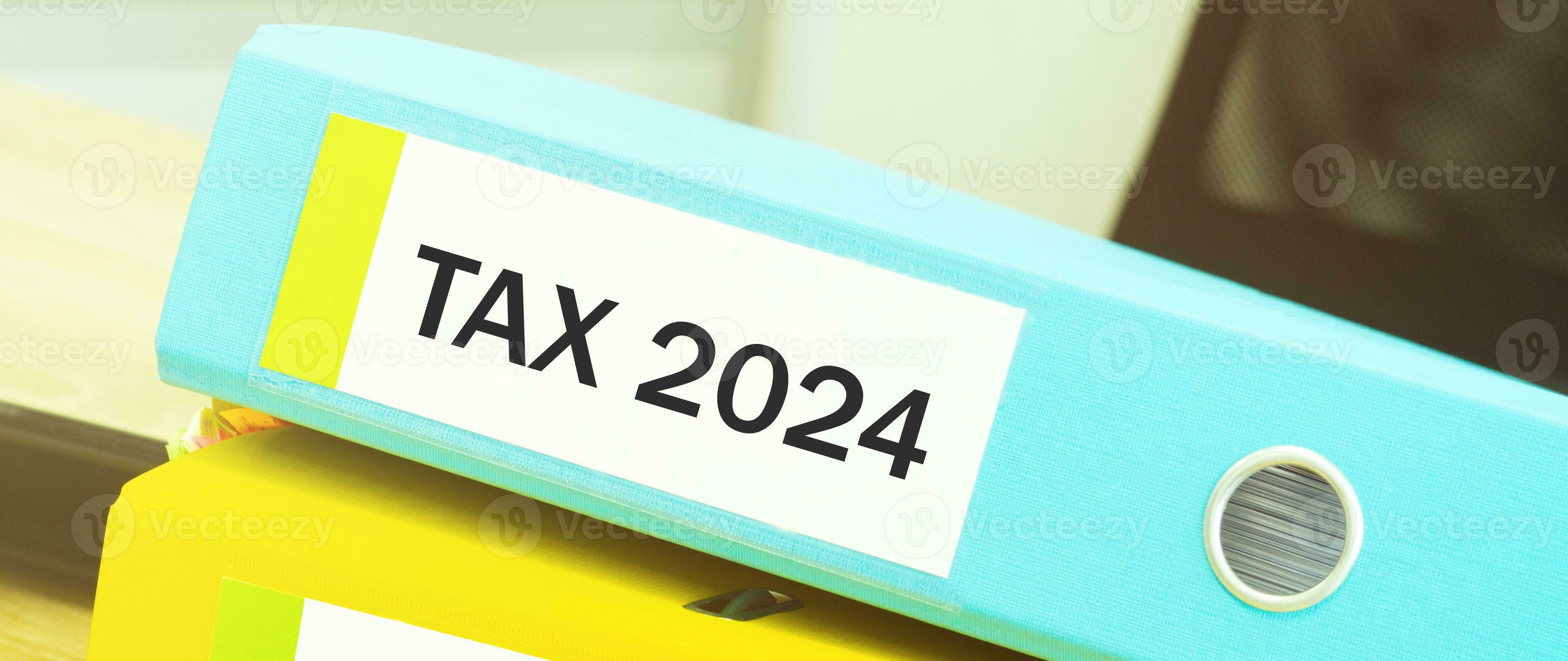 Two office folders with text tax 2024 34093463 Stock Photo at Vecteezy