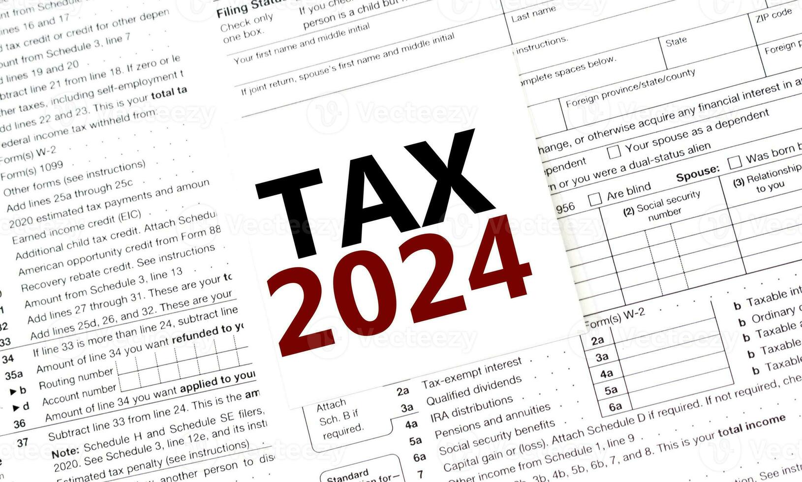 tax 2024 on white sticker with tax forms 34093627 Stock Photo at Vecteezy