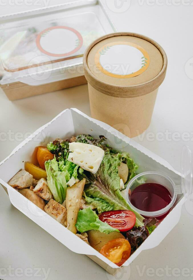 food in containers. proper nutrition, daily diet, weight loss. soup, drink, salad, steak. Top view photo