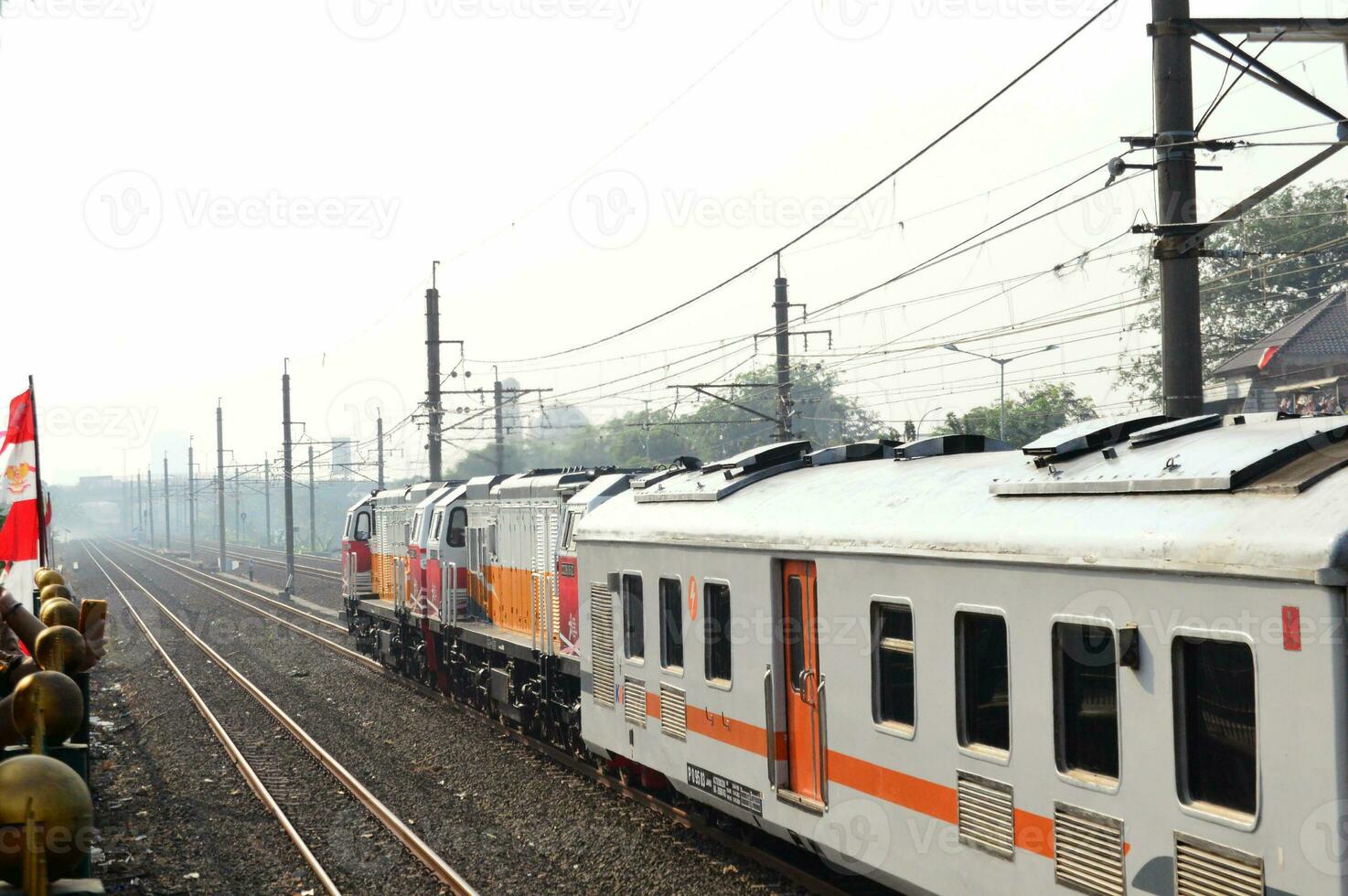 Commuter Line or electric train in Jakarta, Indonesia photo