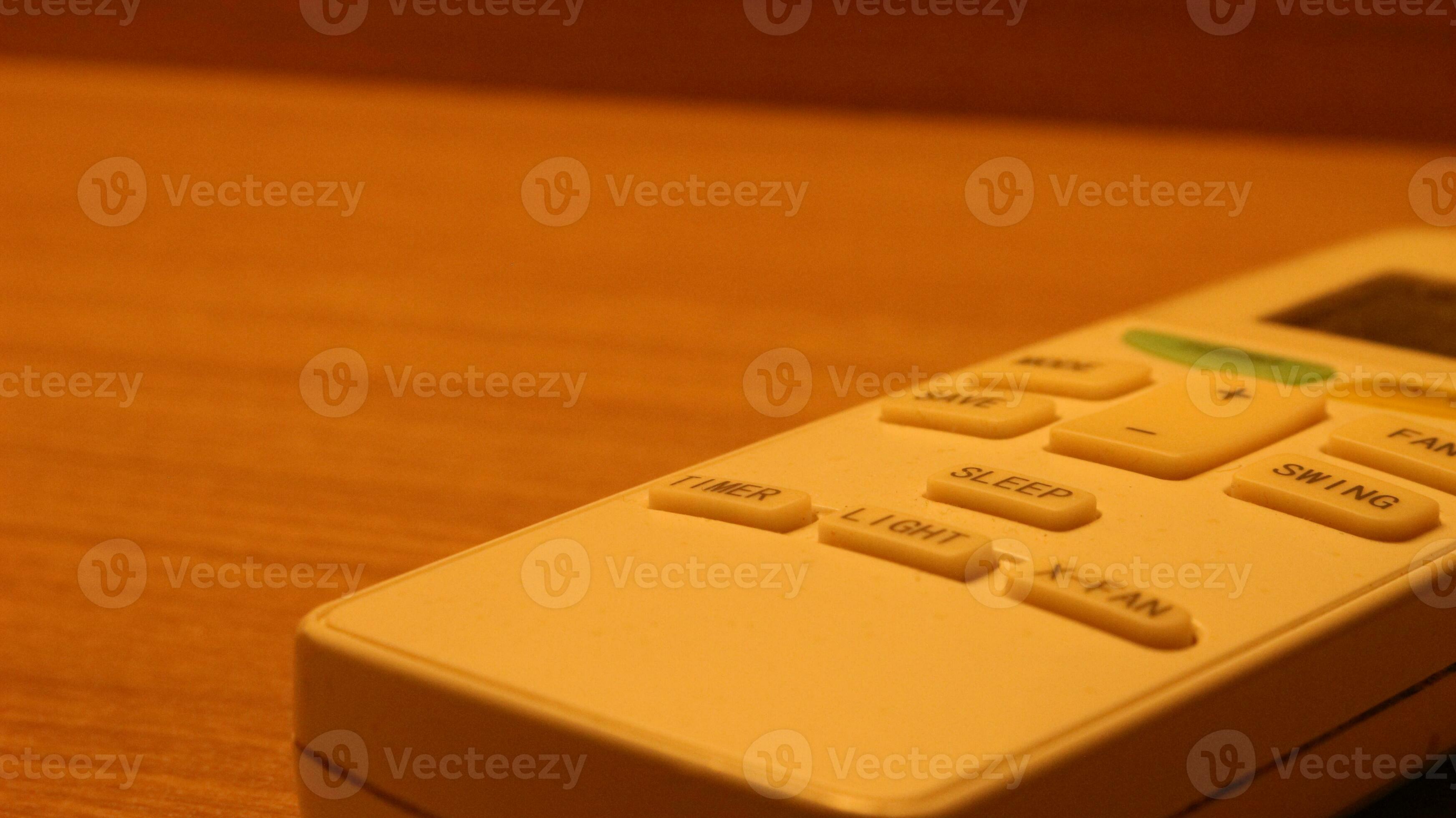 Close up of the air conditioner remote on the table 34124244 Stock