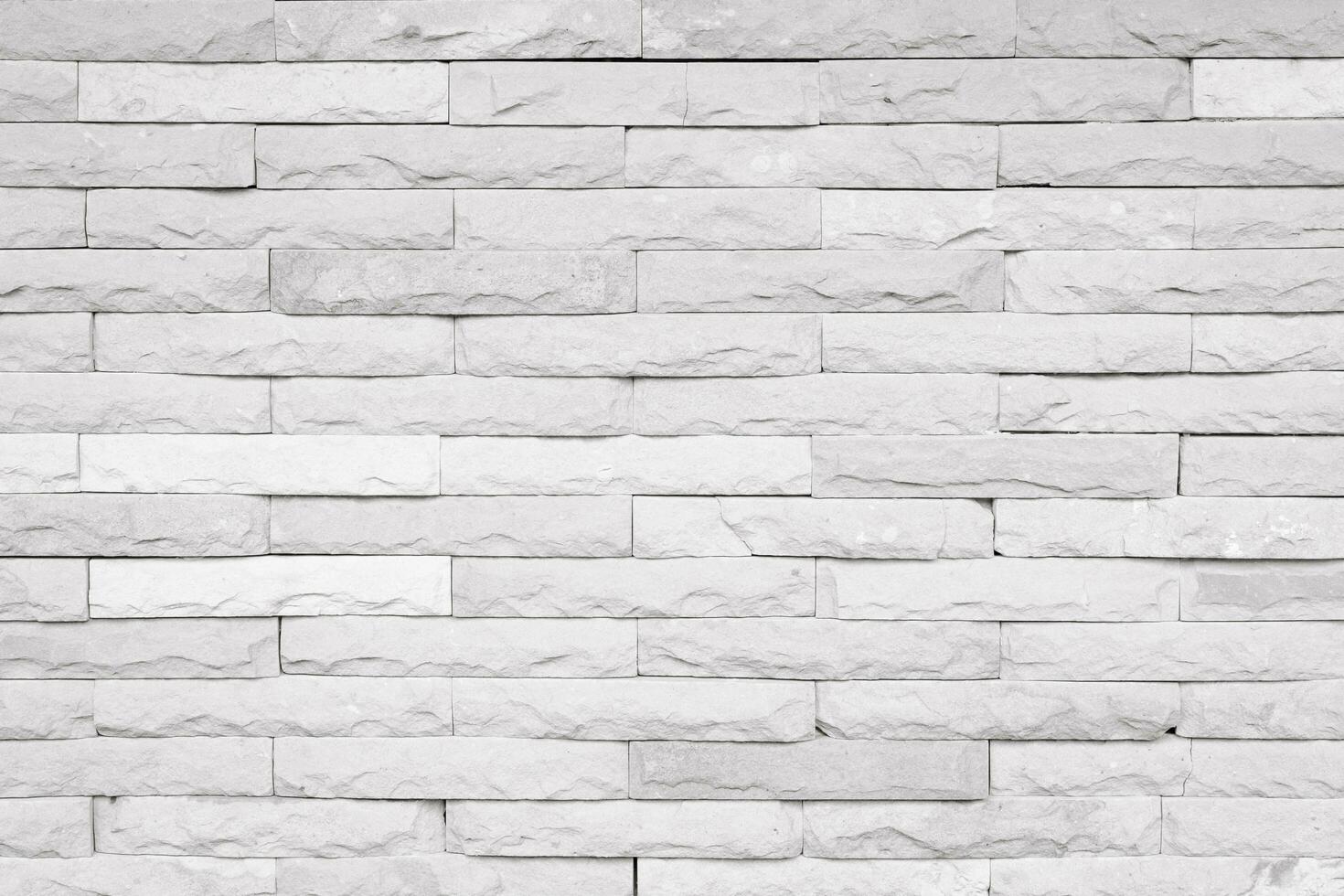Detail of a white brick wall texture and background with copy space photo