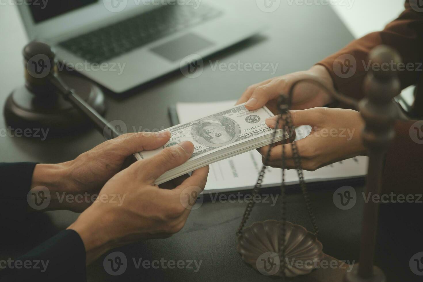 Business and lawyers discussing contract papers with brass scale on desk in office. Law, legal services, advice, justice and law concept picture with film grain effect photo
