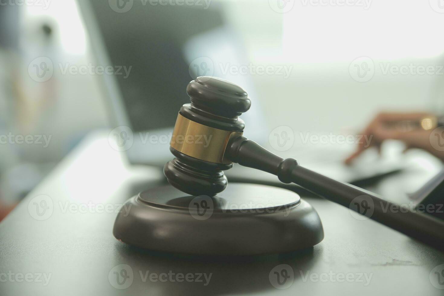 Business and lawyers discussing contract papers with brass scale on desk in office. Law, legal services, advice, justice and law concept picture with film grain effect photo