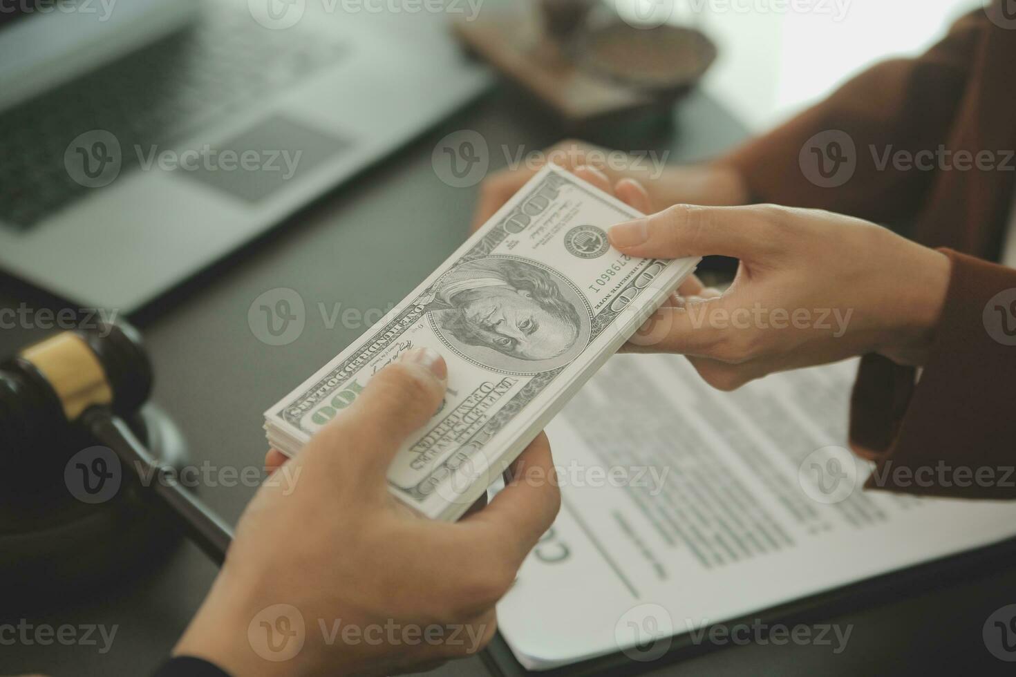 Business and lawyers discussing contract papers with brass scale on desk in office. Law, legal services, advice, justice and law concept picture with film grain effect photo