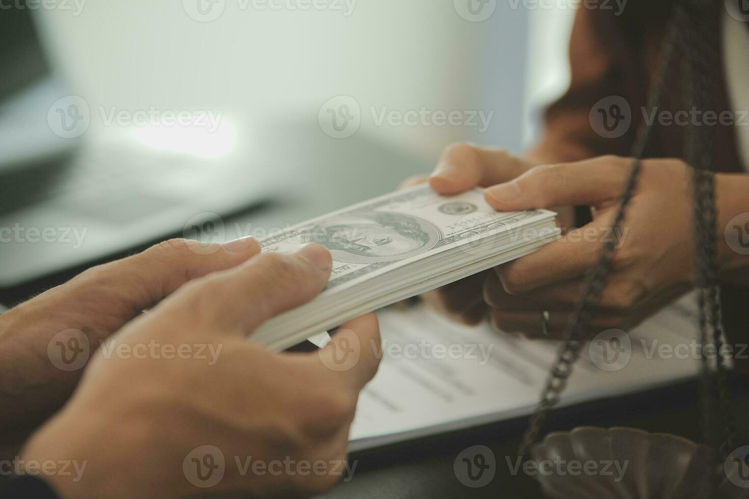 Business and lawyers discussing contract papers with brass scale on desk in office. Law, legal services, advice, justice and law concept picture with film grain effect photo
