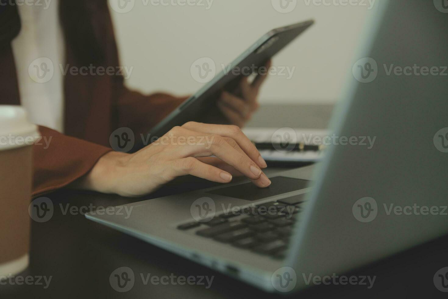 Business and lawyers discussing contract papers with brass scale on desk in office. Law, legal services, advice, justice and law concept picture with film grain effect photo
