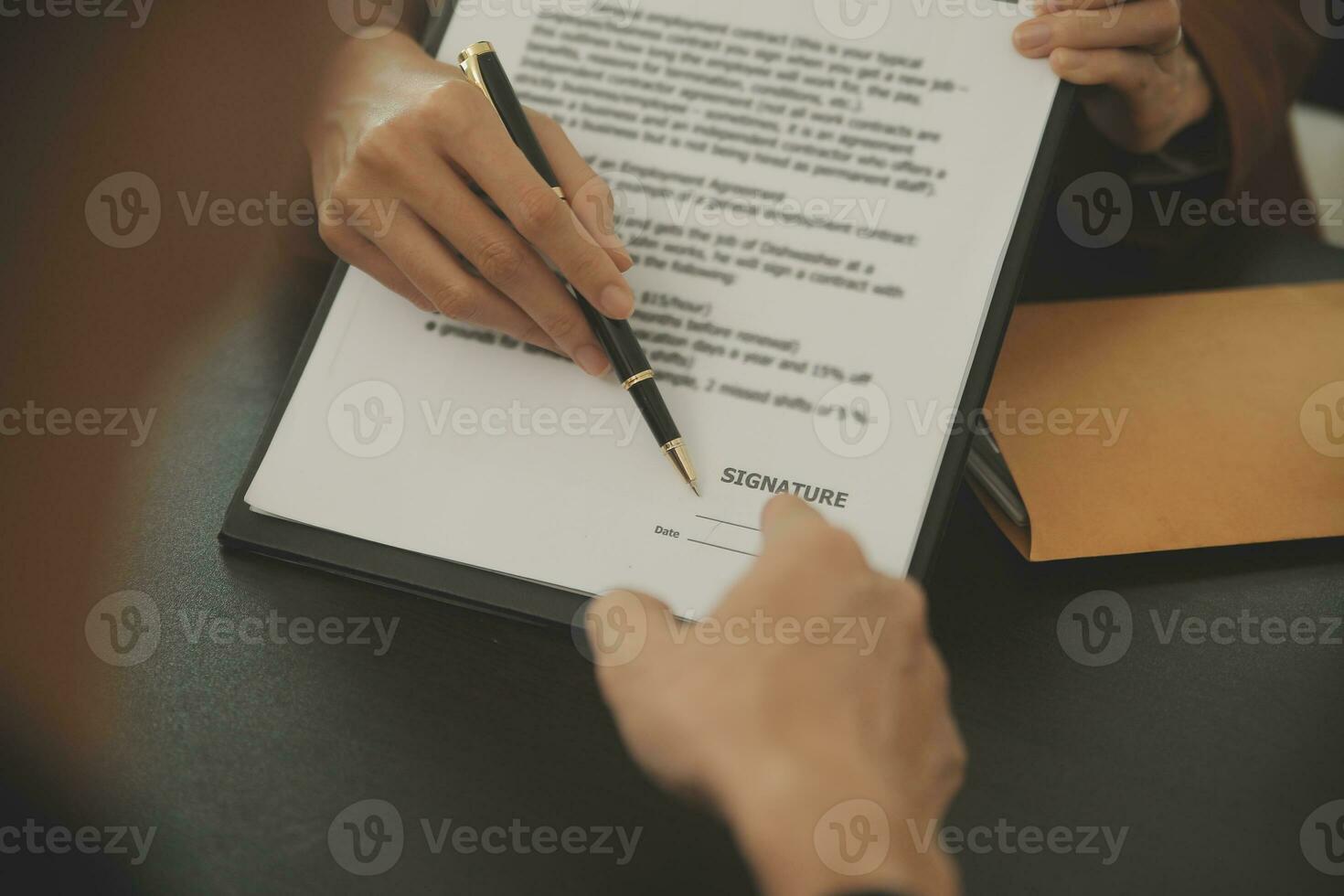 Business and lawyers discussing contract papers with brass scale on desk in office. Law, legal services, advice, justice and law concept picture with film grain effect photo