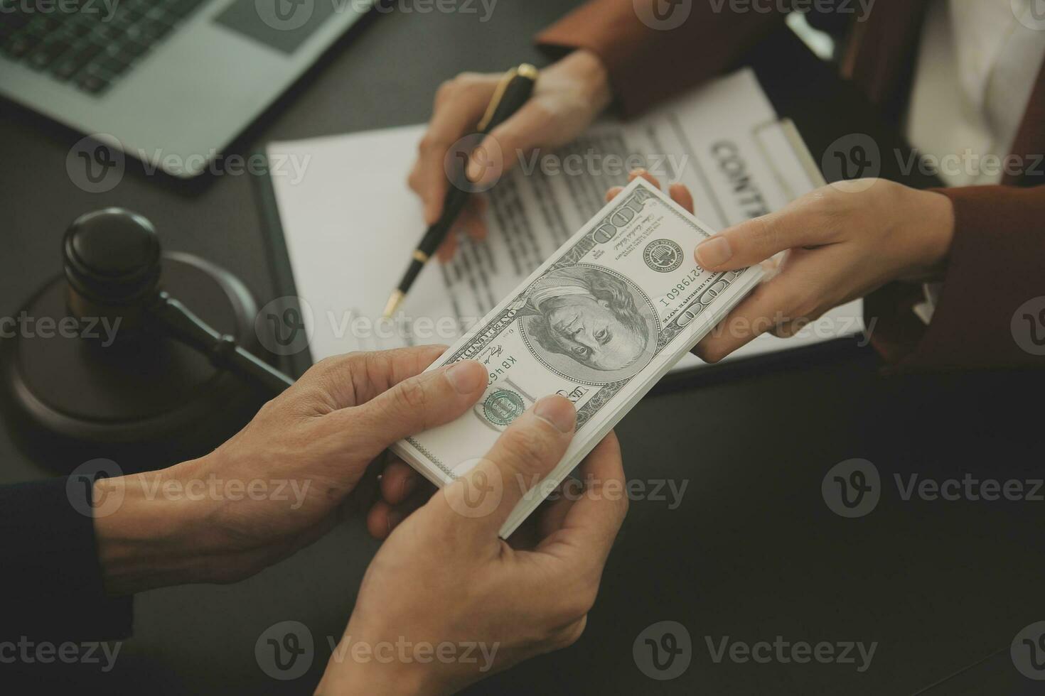 Business and lawyers discussing contract papers with brass scale on desk in office. Law, legal services, advice, justice and law concept picture with film grain effect photo