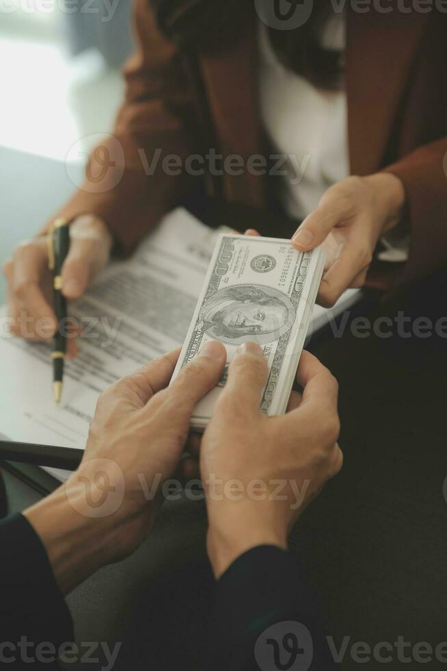 Business and lawyers discussing contract papers with brass scale on desk in office. Law, legal services, advice, justice and law concept picture with film grain effect photo
