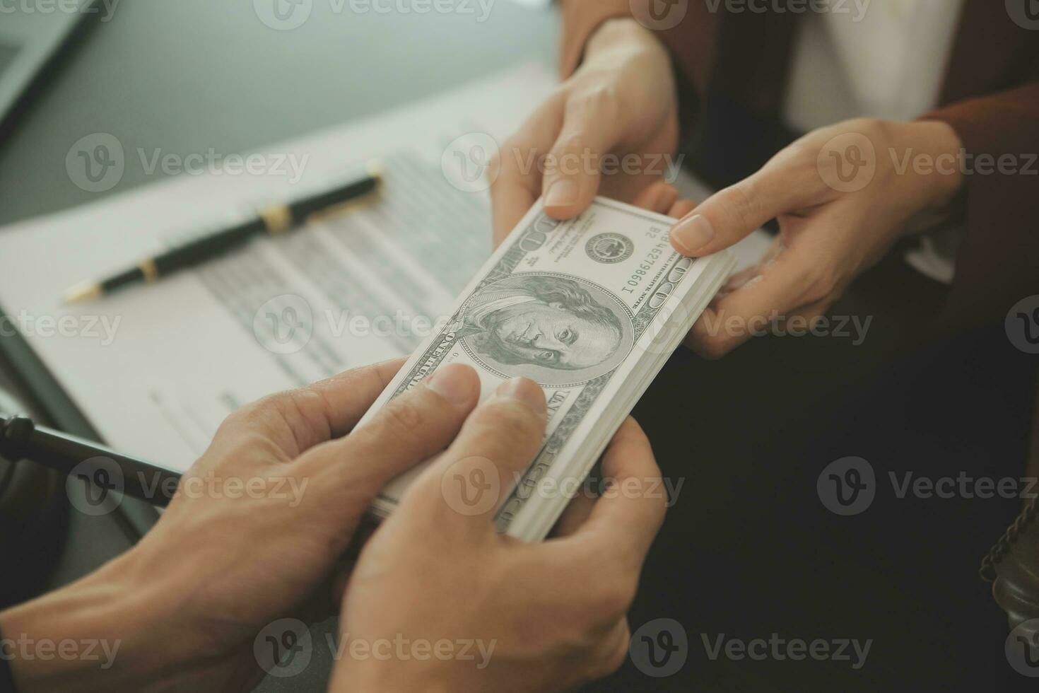 Business and lawyers discussing contract papers with brass scale on desk in office. Law, legal services, advice, justice and law concept picture with film grain effect photo