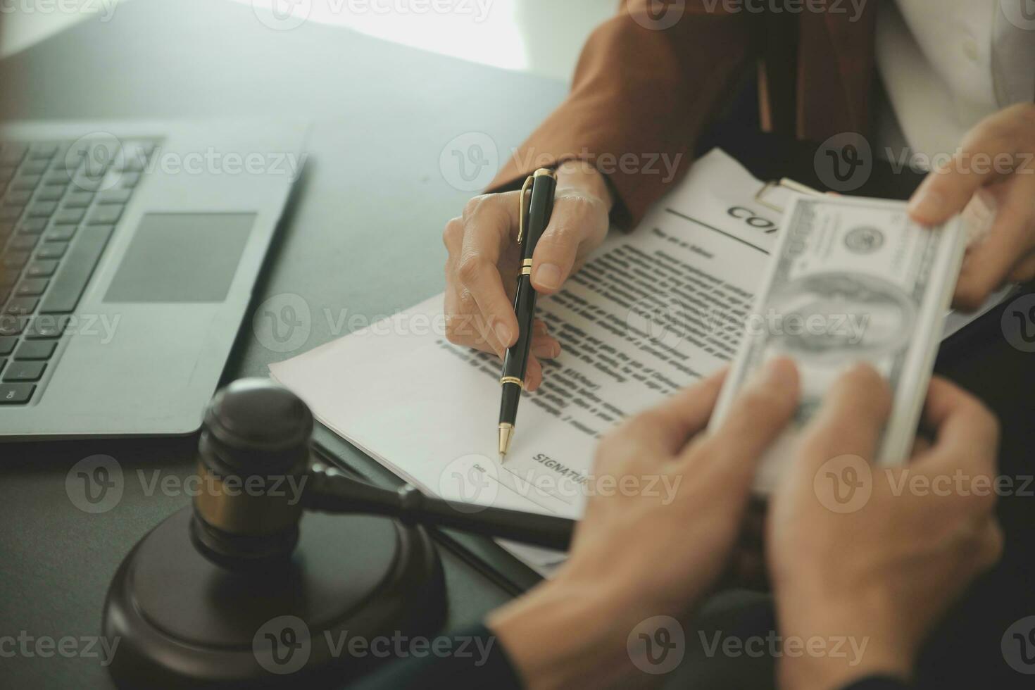Business and lawyers discussing contract papers with brass scale on desk in office. Law, legal services, advice, justice and law concept picture with film grain effect photo