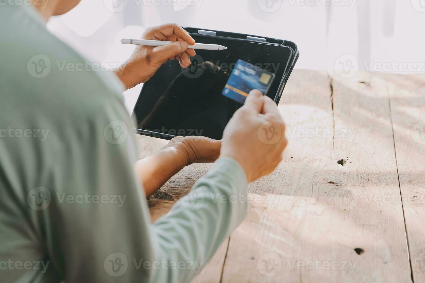 Close up mature man holding plastic credit card, senior couple family paying online, using laptop, satisfied older customers making secure internet payment, shopping, browsing banking service photo