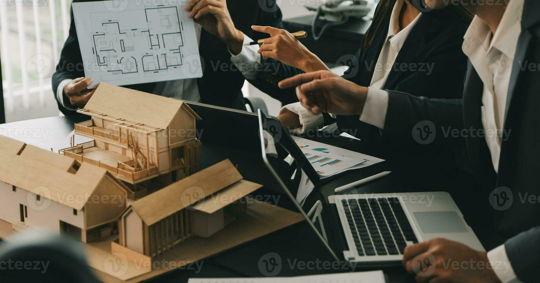 Close up of Business team analyzing income charts and graphs with modern laptop computer. Business analysis and strategy concept. photo