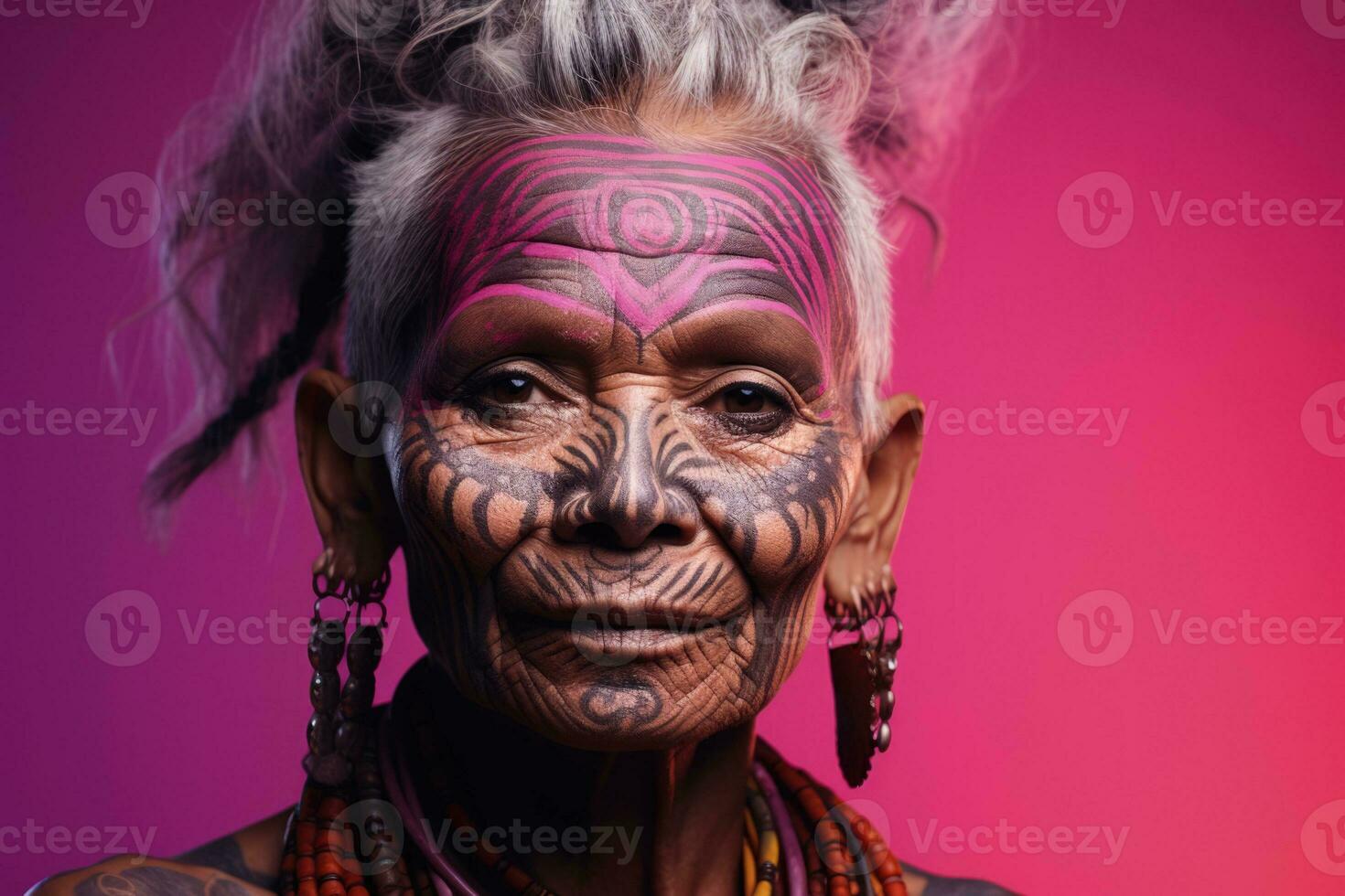 Portrait of ethnic facial tattoos isolated on a mystical magenta to ancient ochre gradient background photo