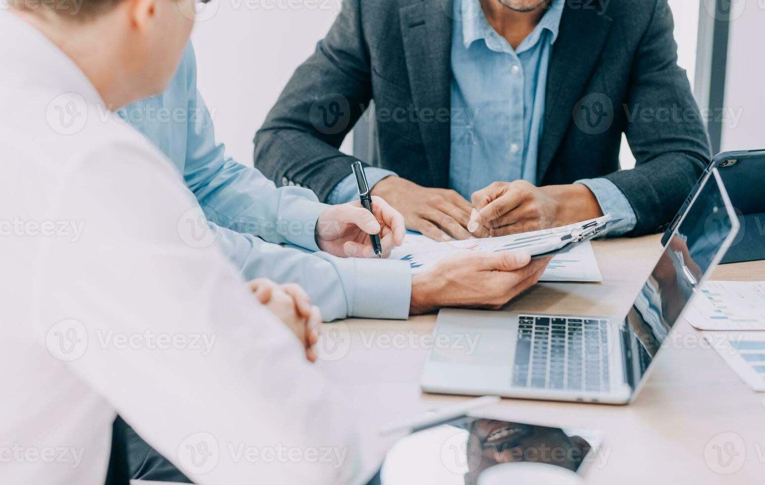 Entrepreneurs and business people conference in modern meeting room, happy multiracial coworkers have fun cooperating working together at office meeting, asian teamwork concept photo