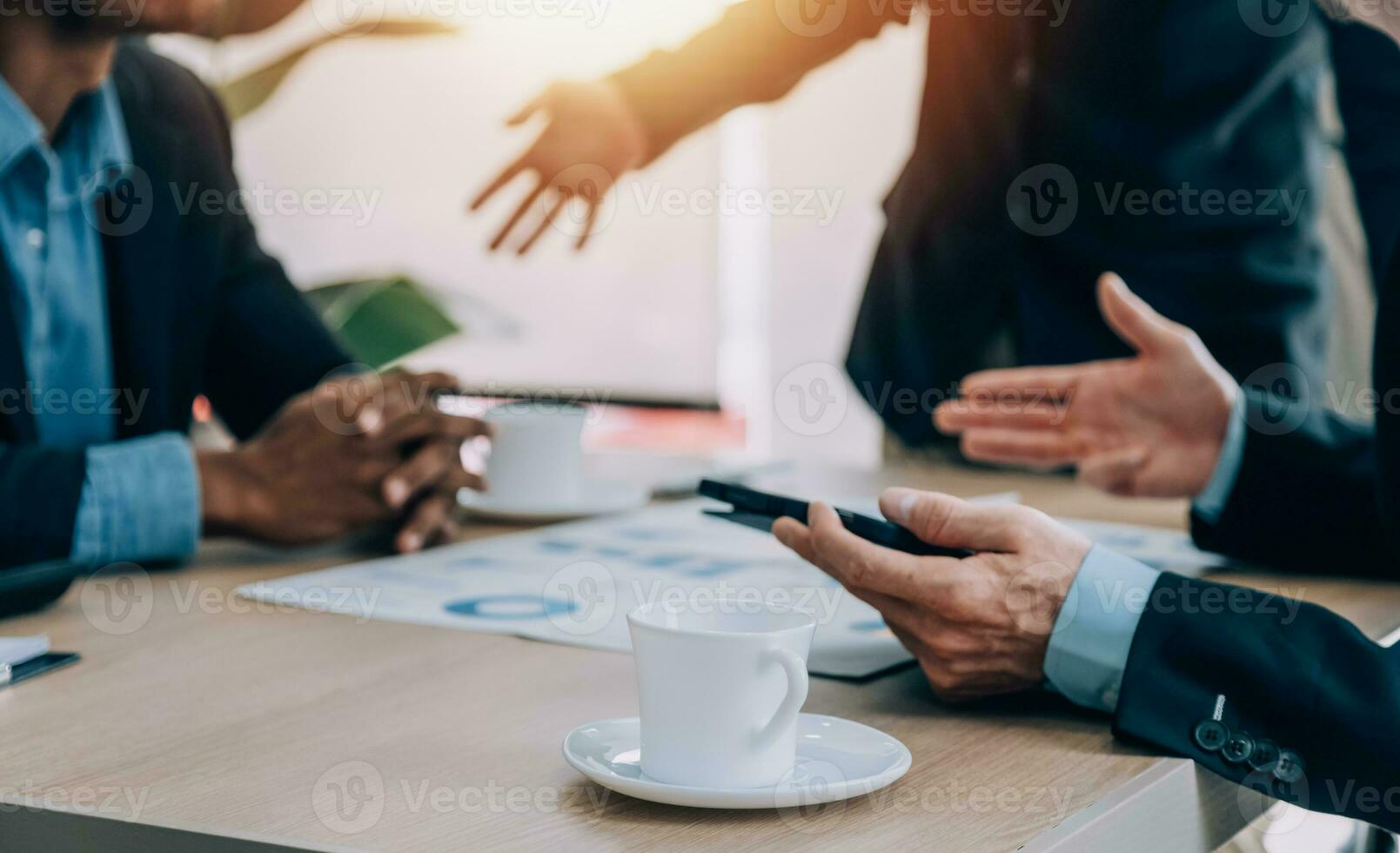 Entrepreneurs and business people conference in modern meeting room, happy multiracial coworkers have fun cooperating working together at office meeting, asian teamwork concept photo