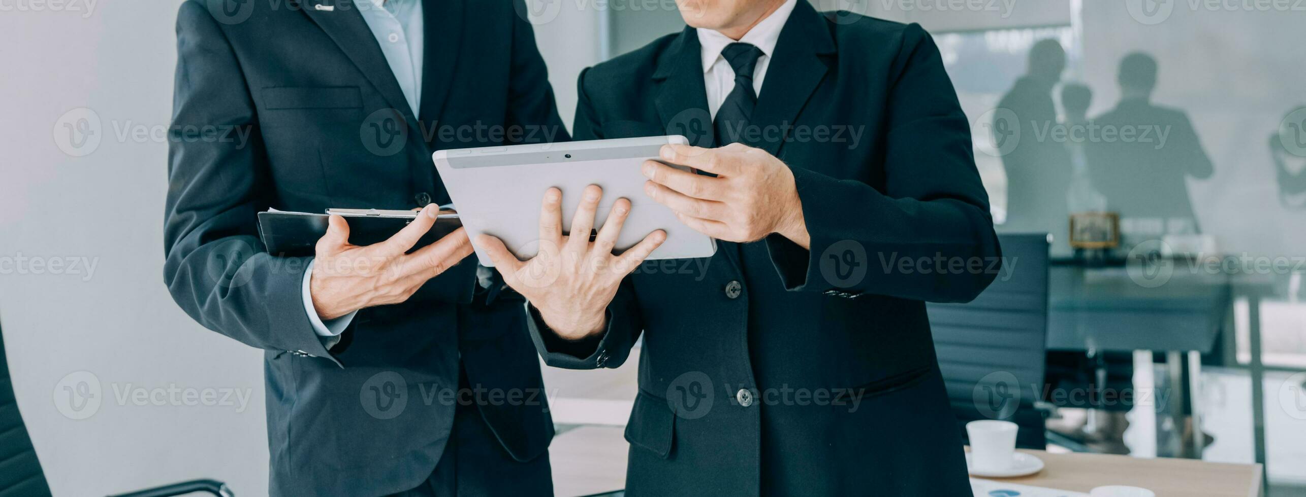 Entrepreneurs and business people conference in modern meeting room, happy multiracial coworkers have fun cooperating working together at office meeting, asian teamwork concept photo