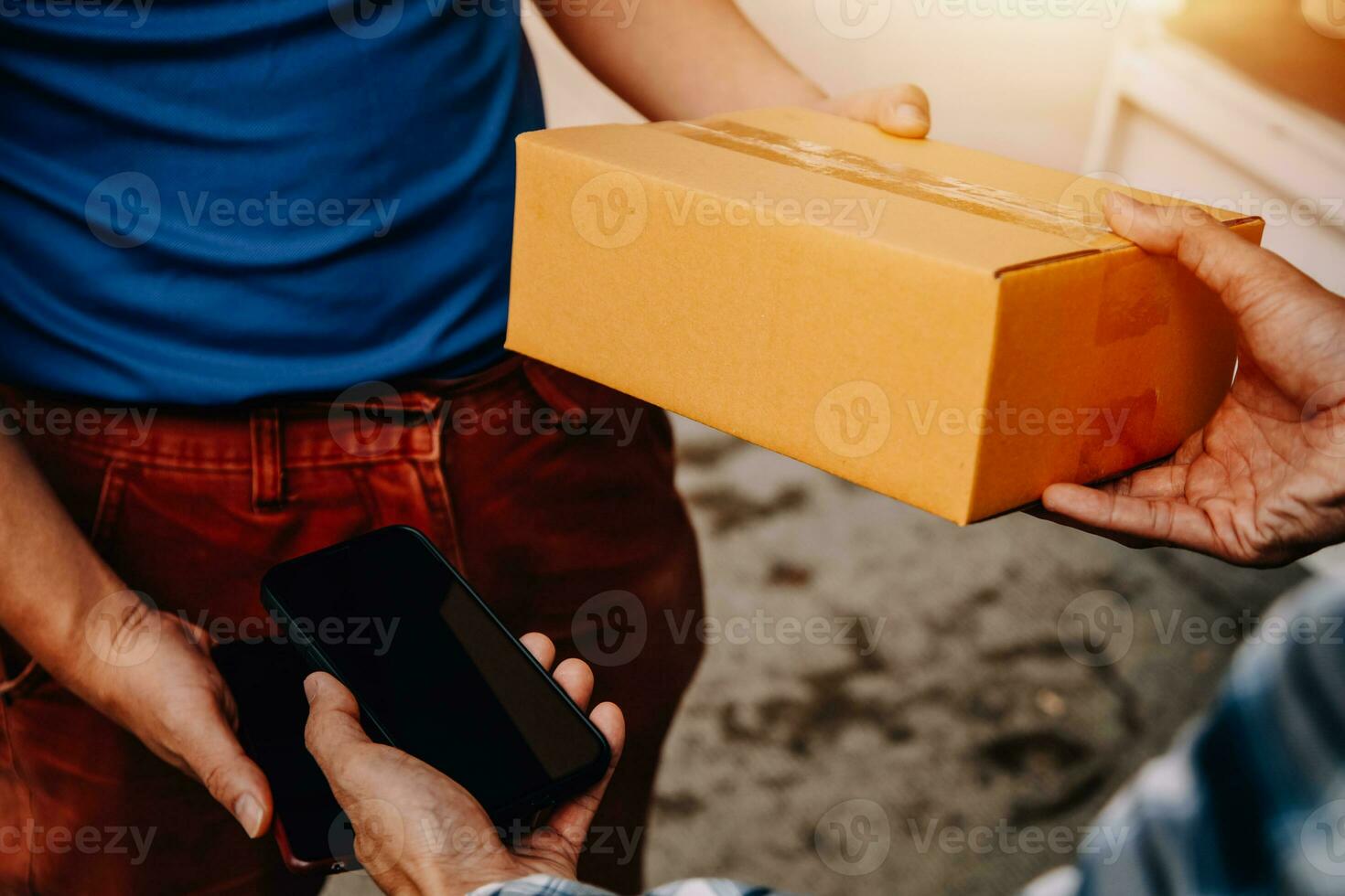 Entrepreneurs Small Business SME Independent men work at home Use smartphones and laptops for commercial checking, online marketing, packing boxes, SME sellers, concept, e-commerce team, online sales photo