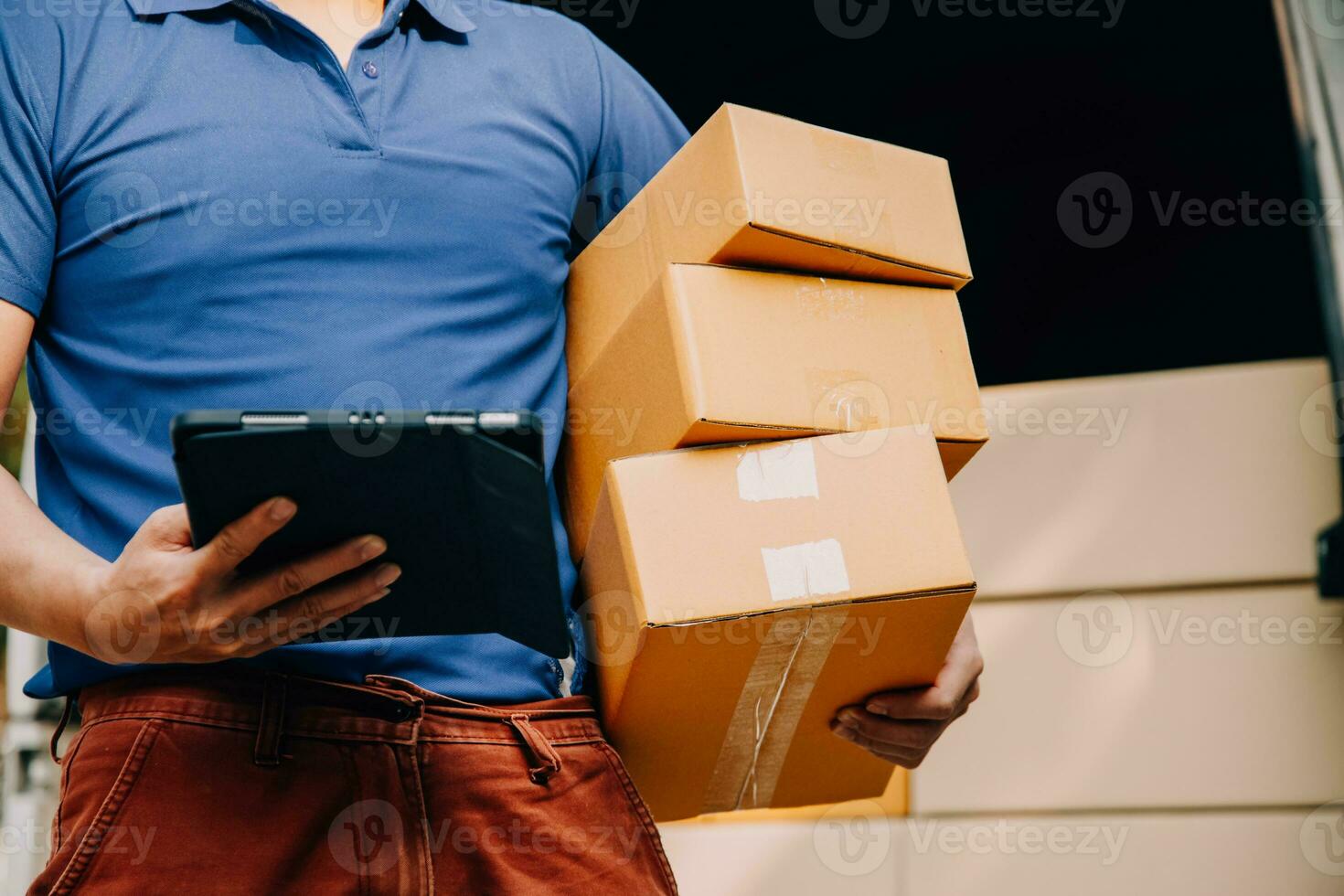 Entrepreneurs Small Business SME Independent men work at home Use smartphones and laptops for commercial checking, online marketing, packing boxes, SME sellers, concept, e-commerce team, online sales photo