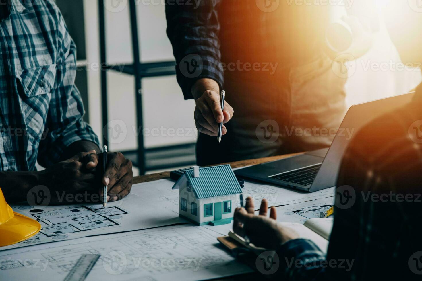 Construction and structure concept of engineer working drawing on blueprint meeting for project working with partner on model building and engineering tools in working site, construction concept photo