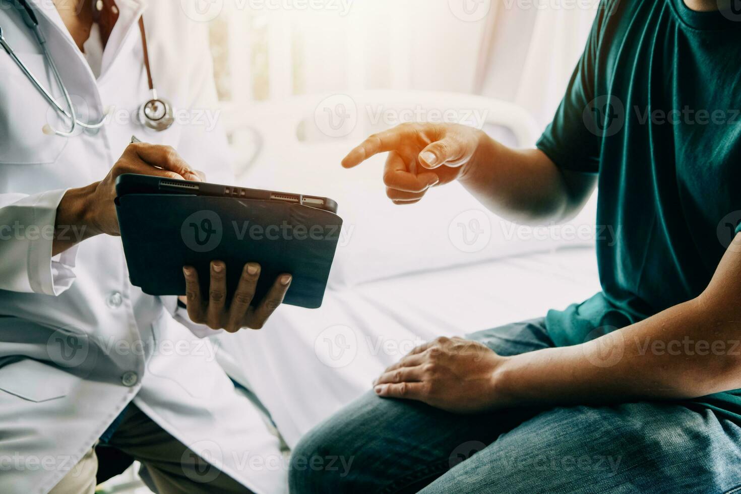 Male patient having consultation with doctor or psychiatrist who working on diagnostic examination on men's health disease or mental illness in medical clinic or hospital mental health service center photo