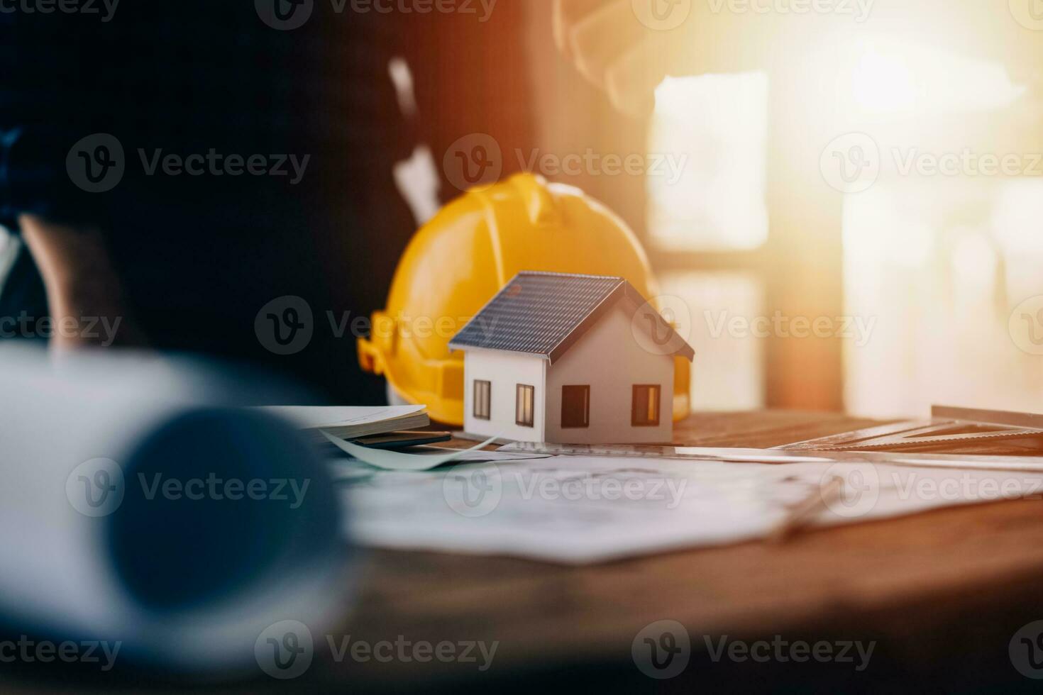 Construction and structure concept of engineer working drawing on blueprint meeting for project working with partner on model building and engineering tools in working site, construction concept photo