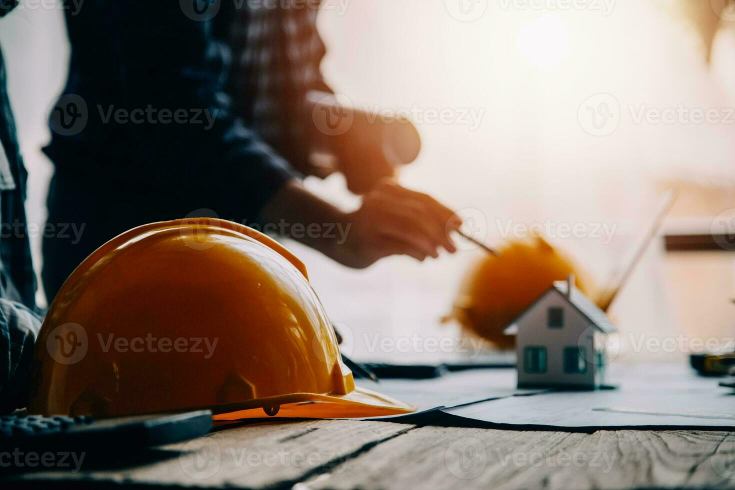 Construction and structure concept of engineer working drawing on blueprint meeting for project working with partner on model building and engineering tools in working site, construction concept photo