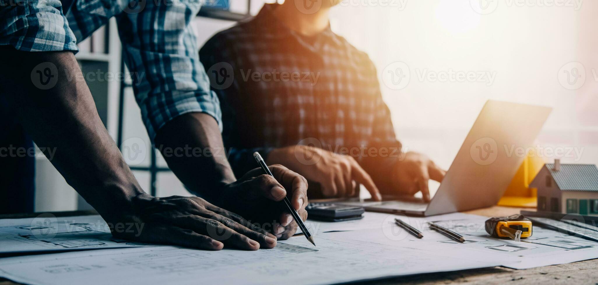 Construction and structure concept of engineer working drawing on blueprint meeting for project working with partner on model building and engineering tools in working site, construction concept photo