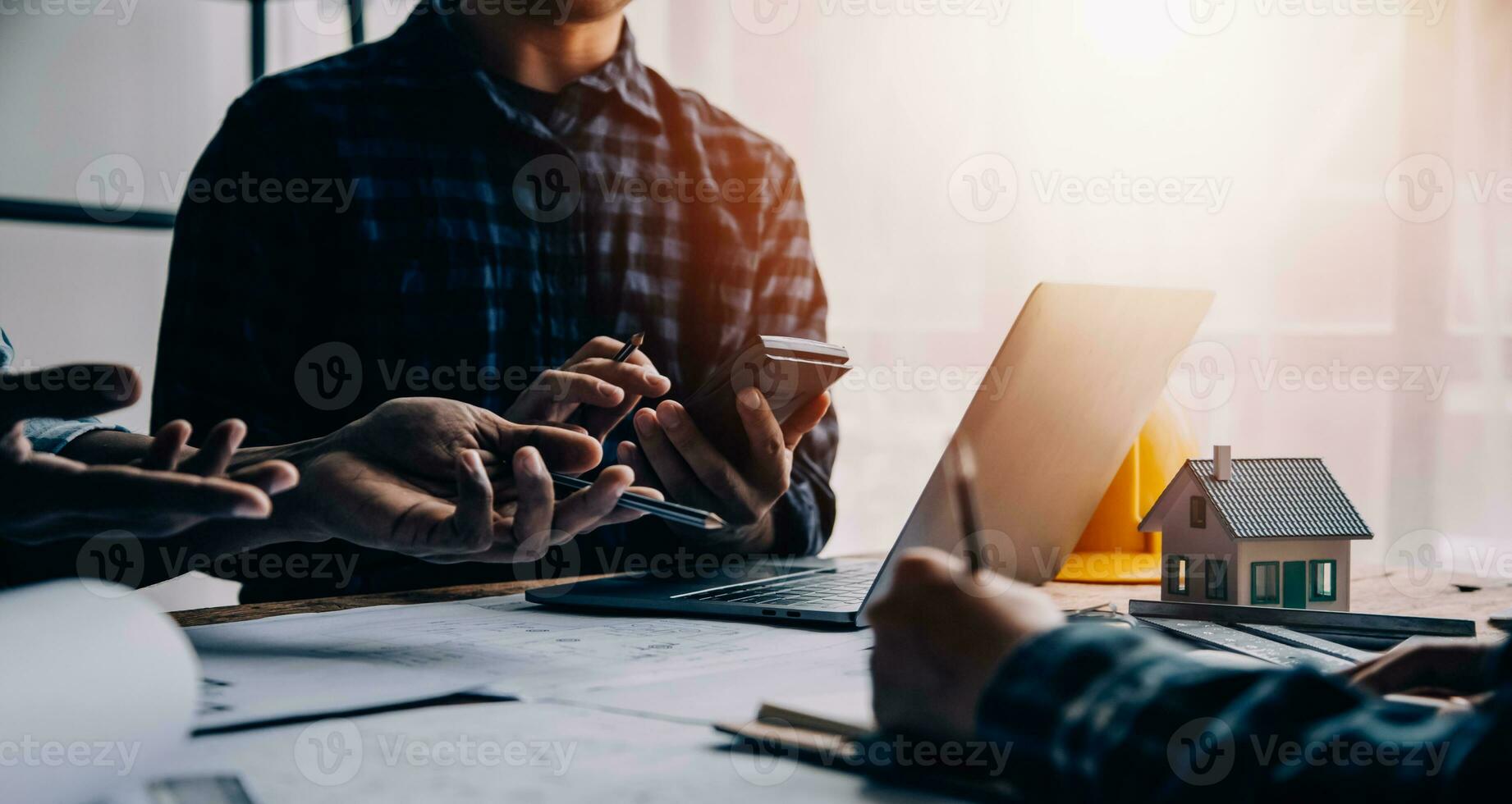 Construction and structure concept of engineer working drawing on blueprint meeting for project working with partner on model building and engineering tools in working site, construction concept photo