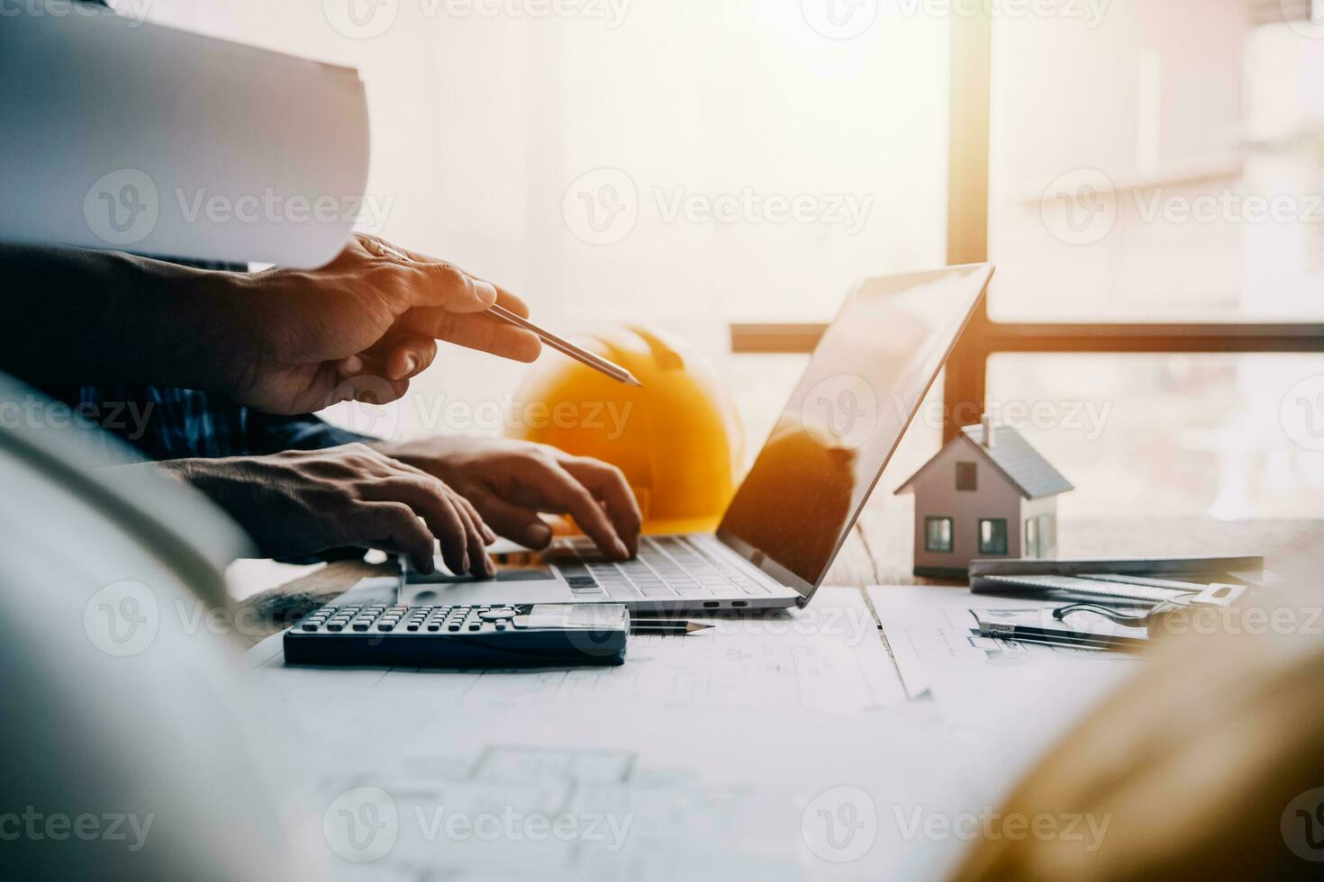 Construction and structure concept of engineer working drawing on blueprint meeting for project working with partner on model building and engineering tools in working site, construction concept photo