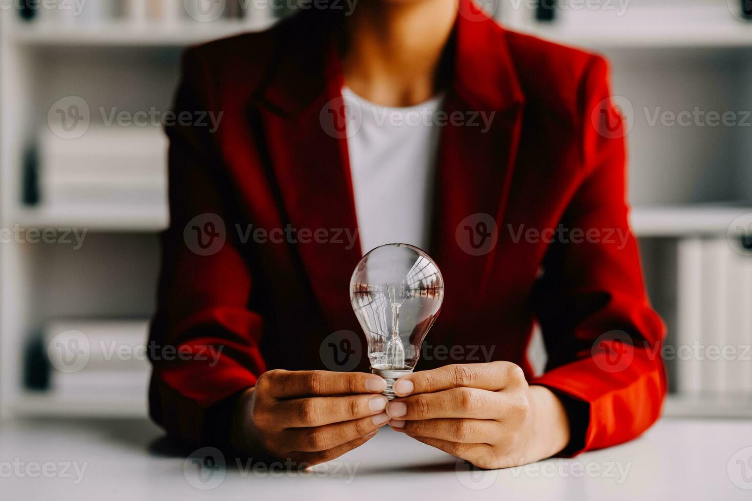 hand holding light bulb. idea concept with innovation and inspiration photo