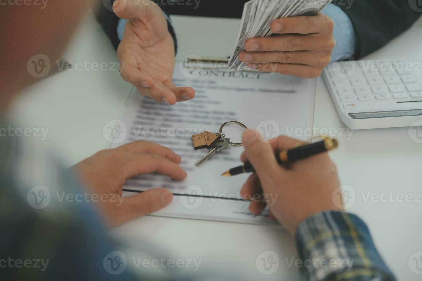 Real estate agent and customer signing contract to buy house, insurance or loan real estate.rent a house,get insurance or loan real estate or property. photo