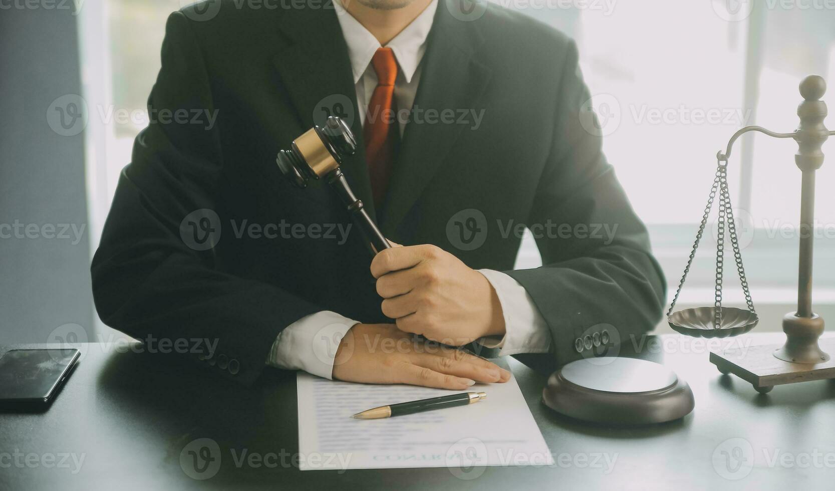 Business and lawyers discussing contract papers with brass scale on desk in office. Law, legal services, advice, justice and law concept picture with film grain effect photo