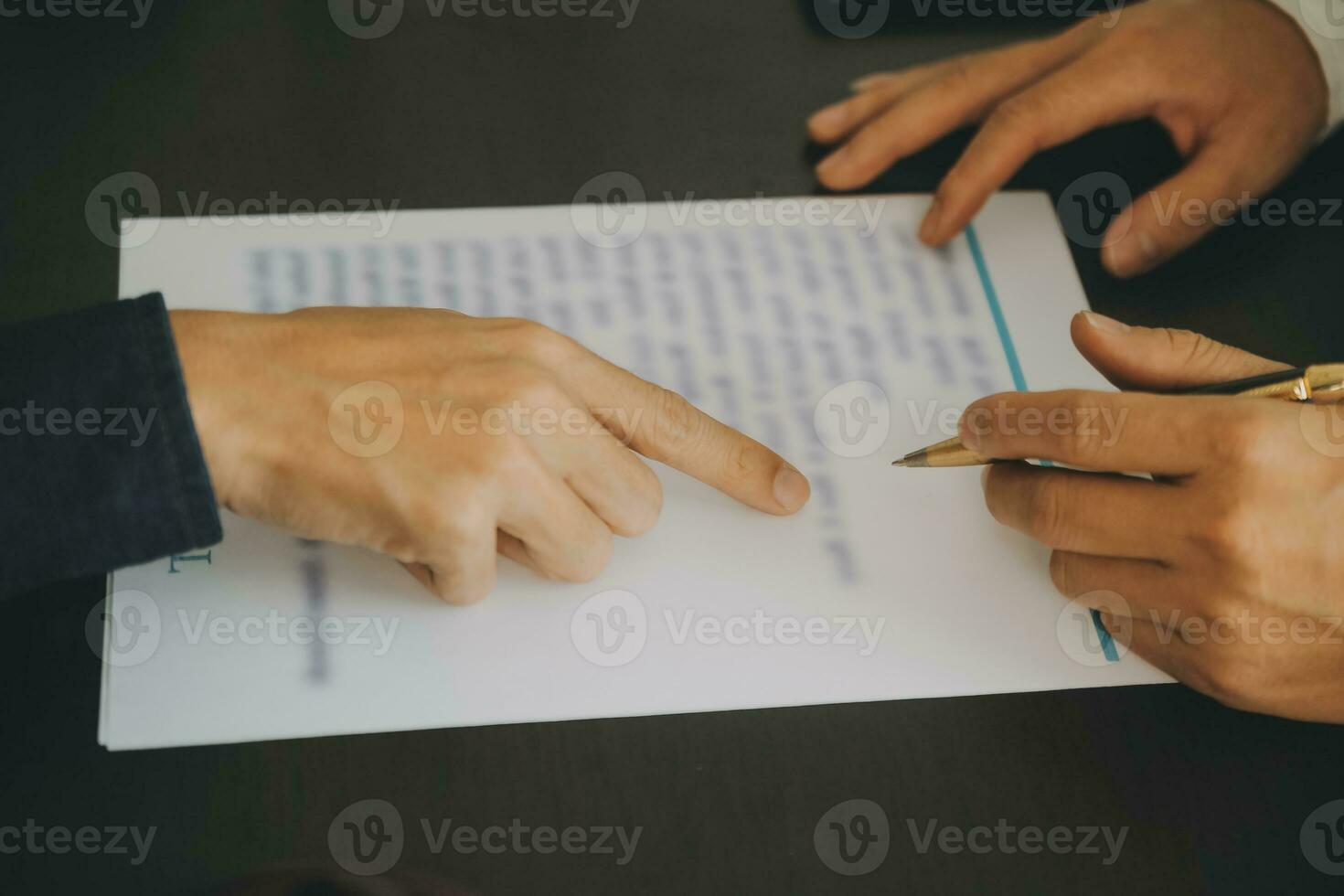 Business and lawyers discussing contract papers with brass scale on desk in office. Law, legal services, advice, justice and law concept picture with film grain effect photo