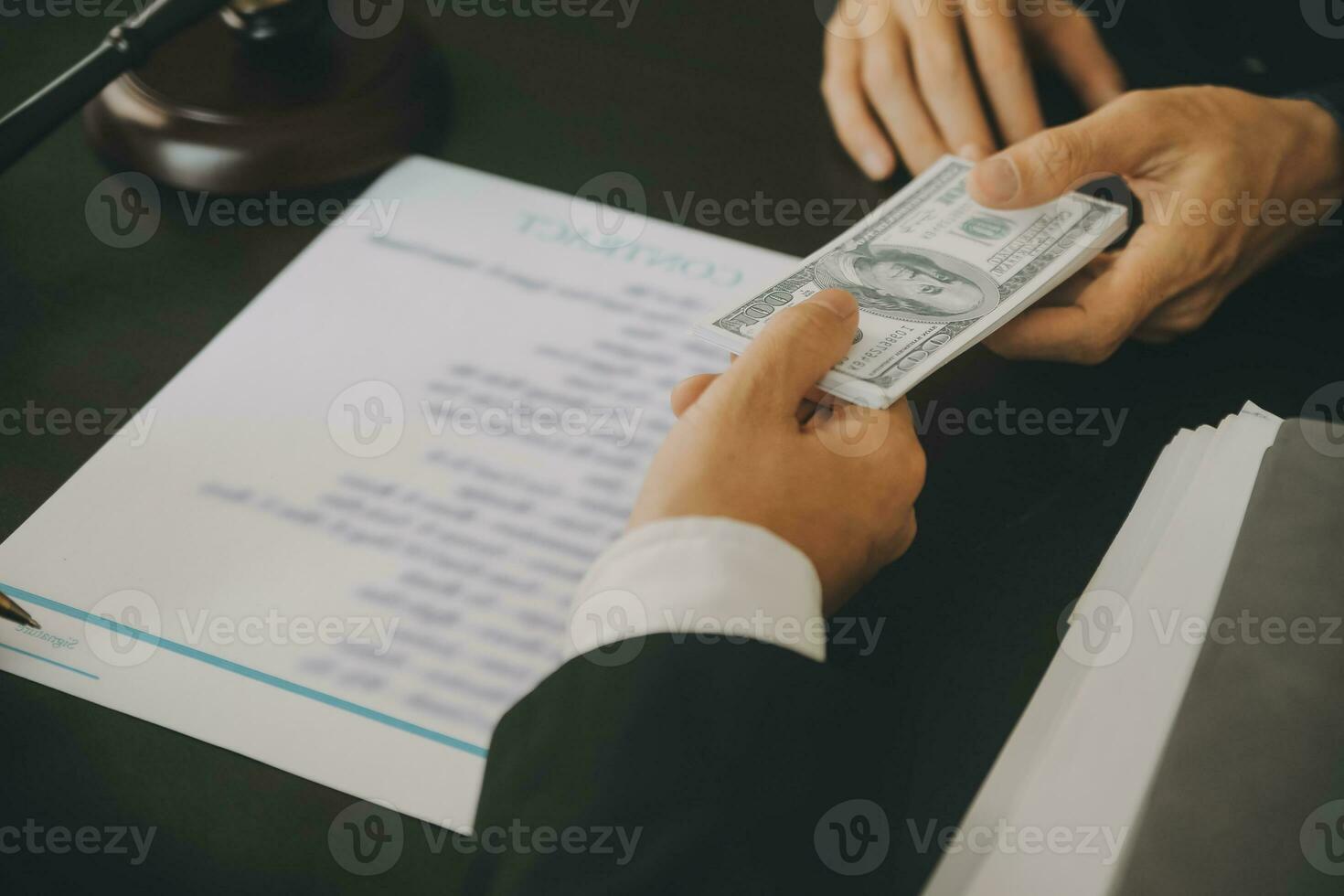 Business and lawyers discussing contract papers with brass scale on desk in office. Law, legal services, advice, justice and law concept picture with film grain effect photo