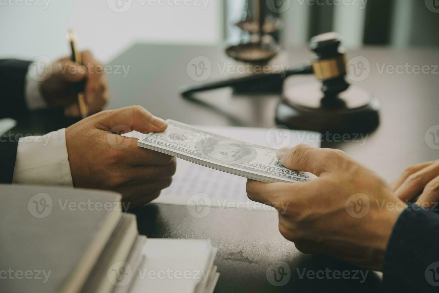 Business and lawyers discussing contract papers with brass scale on desk in office. Law, legal services, advice, justice and law concept picture with film grain effect photo
