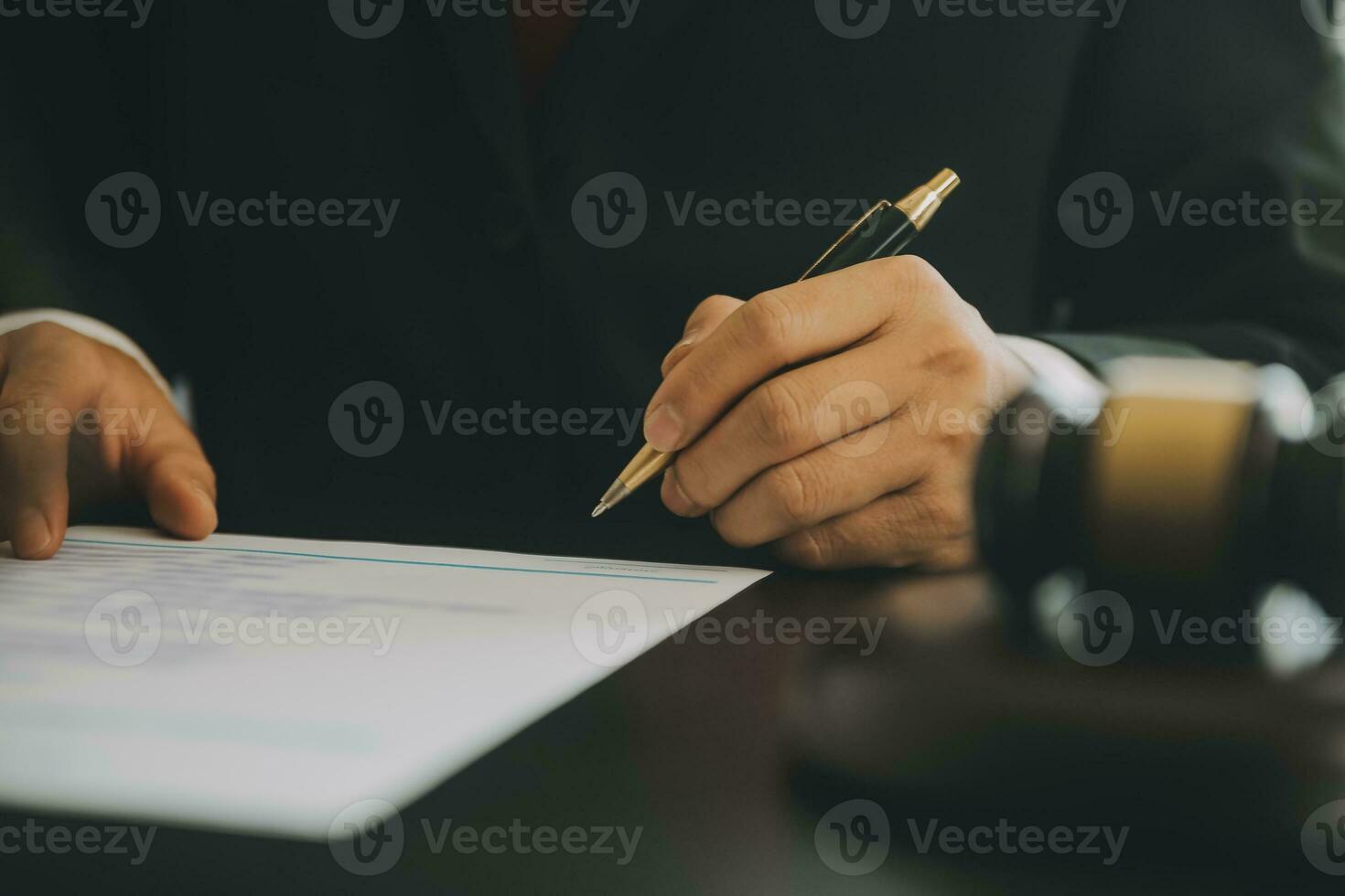 Business and lawyers discussing contract papers with brass scale on desk in office. Law, legal services, advice, justice and law concept picture with film grain effect photo